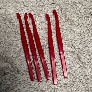 Set of Red Tupperware citrus peelers. *new
